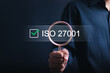 © Pakin - ISO 27001 concept. Businessman choose ISO 27001 for information security management system (ISMS). requirements, certification, management, standards.