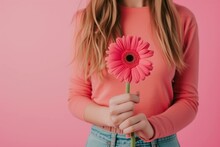 Woman With Pink Gerbera Flower