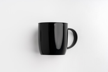 Wall Mural - Black coffee mug mock up on white background copy space