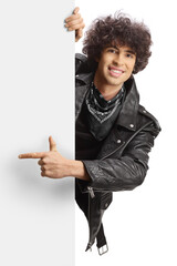 Sticker - Young man in a leather jacket pointing at a blank panel