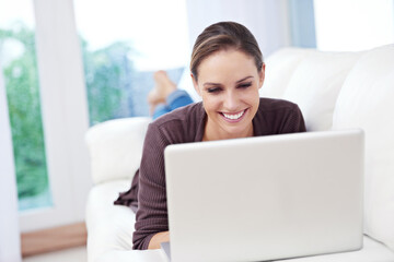 Poster - Woman, laptop and relax on sofa for remote work, streaming movies and update blog post at home. Happy freelancer, computer and download subscription, online shopping and search news on social media