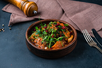 Canvas Print - Lunch canned stewed meat with vegetables, potatoes, tomatoes, onions, peppers, carrots, pomegranate seeds and herbs.