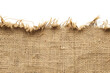 © Oksana - Burlap texture. A piece of torn burlap on a white background.