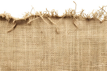 Burlap texture. A piece of torn burlap on a white background.