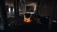 Inside Unmarried Indonesian Men Bachelor's House, Pot On Fire Inside Hut