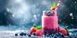 Glass jar of strawberry and blueberry smoothie isolated on grey background