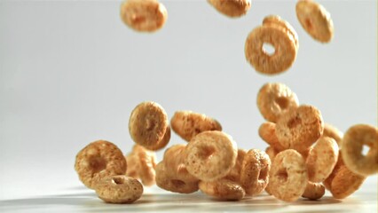 Sticker - Corn flakes falling on white background. Filmed on a high-speed camera at 1000 fps. High quality FullHD footage