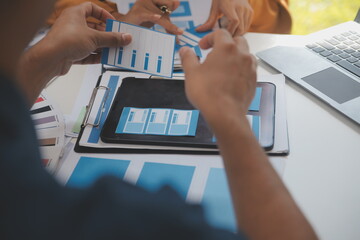 Close up ux developer and ui designer use augmented reality brainstorming about mobile app interface wireframe design on desk at modern office.Creative digital development agency