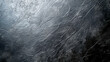 A rugged black metallic wall background with scratches and textures