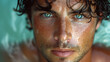 Closeup stunning handsome athletic summer sexy surfer model man with hazel blue eyes and brown hair looking posing on the beach