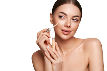 portrait beautiful young woman with clean fresh skin. model with foundation makeup bottle. cosmetolo