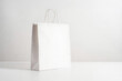 © ARVD73 - White Paper bag on white background. Mockup for design,empty space,copy space.