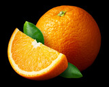Fototapeta  - Orange isolated on black. Orange with slice and leaves on black background. Orange fruit for dark design. Full depth of field.
