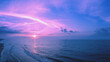 Early morning on the beach. Pink sunrise over the sea
