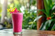 © LimeSky - Dragon fruit smoothie served in an outdoor tropical cafe