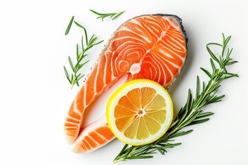 Raw salmon fillet and cooking ingredients on black stone table