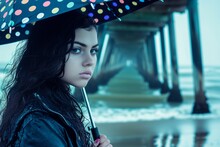 Young Lady With A Polka Dot Umbrella By A Rainy Pier
