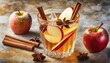 a textured background features fresh apple cider cocktails adorned with cinnamon sticks star anise and apple slices within an ice filled crystal glass