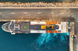 Top down view of People and cars leaving a ferry docked in Rhodes, Greece