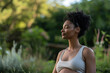 © wolfhound911 - African American Woman meditating and practicing yoga for a peaceful, healthy pregnancy