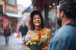 male surprising female with bouquet, street restaurant, delighted reaction