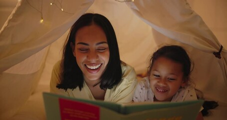 Wall Mural - Mother, daughter and storytelling in tent with book and bonding together for child development in home. Woman, girl and relax indoor at night for fairytale stories, fun and love with excited to read