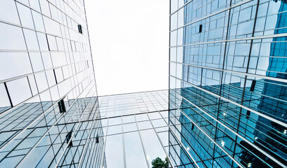 Canvas Print - Low angle view of modern office building exterior