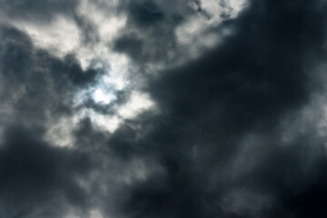 Wall Mural - Dark and dramatic storm clouds on the sky