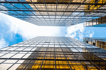 Wall Mural - Low angle view of modern office buildings in HongKong