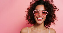 Studio Portrait Of A Cool Young Woman Posing Wearing Heart Shaped Love Sunglasses