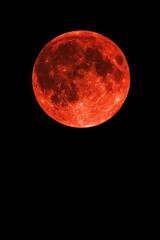 bloody moon, full moon on black, copy space.