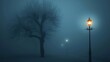 Mystical foggy night with glowing street lamp and silhouette of a leafless tree. Copy space 