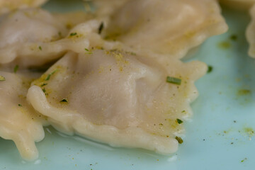 Wall Mural - small dumplings with wheat flour and pieces of meat