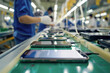 © Degimages - Mobile phone assembly factory, assembly lines with workers handling components like screens, processors, and batteries. They assemble and test mobile phones.