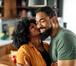 © Lumos sp - woman man couple happy together hug bonding talking dating  leisure fun smiling love young home kitchen two girlfriend boyfriend date wife relationship african american romance kiss kissing