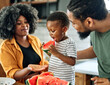 © Lumos sp - child family kitchen food boy son father mother watermelon fruit slice summer organic meal fun preparing healthy diet eating home black