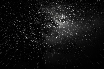 Wall Mural - A captivating black and white photo of a star-filled sky. Perfect for adding a touch of wonder and serenity to any project