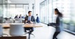 © Stock Pix - Dynamic long-exposure shot of professionals in a modern office, highlighting the hustle of corporate life