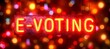 E voting text on blurred magical background, illustrating internet voting concept