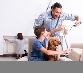 Wall Mural - Young family doing home renovation