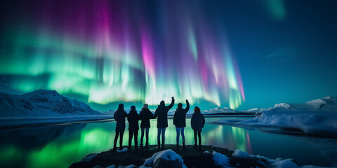 a group of tourist are watching the northern light aurora borealis at a northern light guided tour