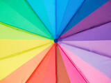 Fototapeta Tęcza - Multicolored umbrella close-up. Colors of the LGBT community. Background, texture.
