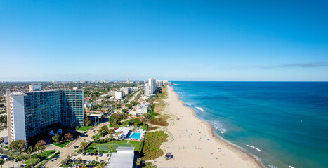 Wall Mural - panoramic drone view of city and ocean in florida