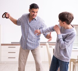 Wall Mural - Father beating and punishing his sone