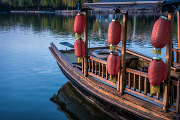 Wall Mural - Traditional Chinese boat docked on the lake