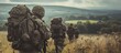© The 2R Artificiality - British army soldiers, both male and female, tabbing across Wiltshire's open countryside carrying 25Kg bergens.