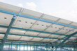 Solar car parking or parking lot at outdoor. Roof canopy covered or construction from solar panel. Innovation system technology to generate electricity from light. Concept of green clean power energy.
