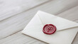Envelope with wax seal on wooden background. Valentine's day concept