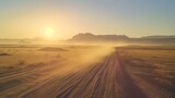Fototapeta  - Safaris, trips to Africa, extreme sports, or scientific research in a stony desert are all possible. Dawn over the Sahara desert, dusty mountains, hills, and remnants of an off-road vehicle.