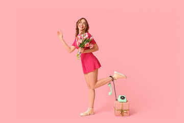 Sticker - Young woman with retro telephone, gift box and bouquet of beautiful tulips on pink background. International Women's Day